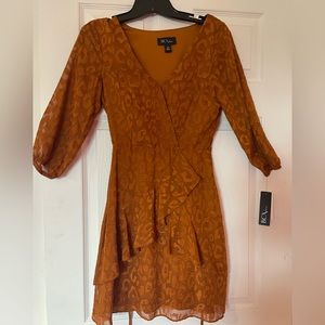 BCX beautiful ruffled dress never worn with tags size extra small.